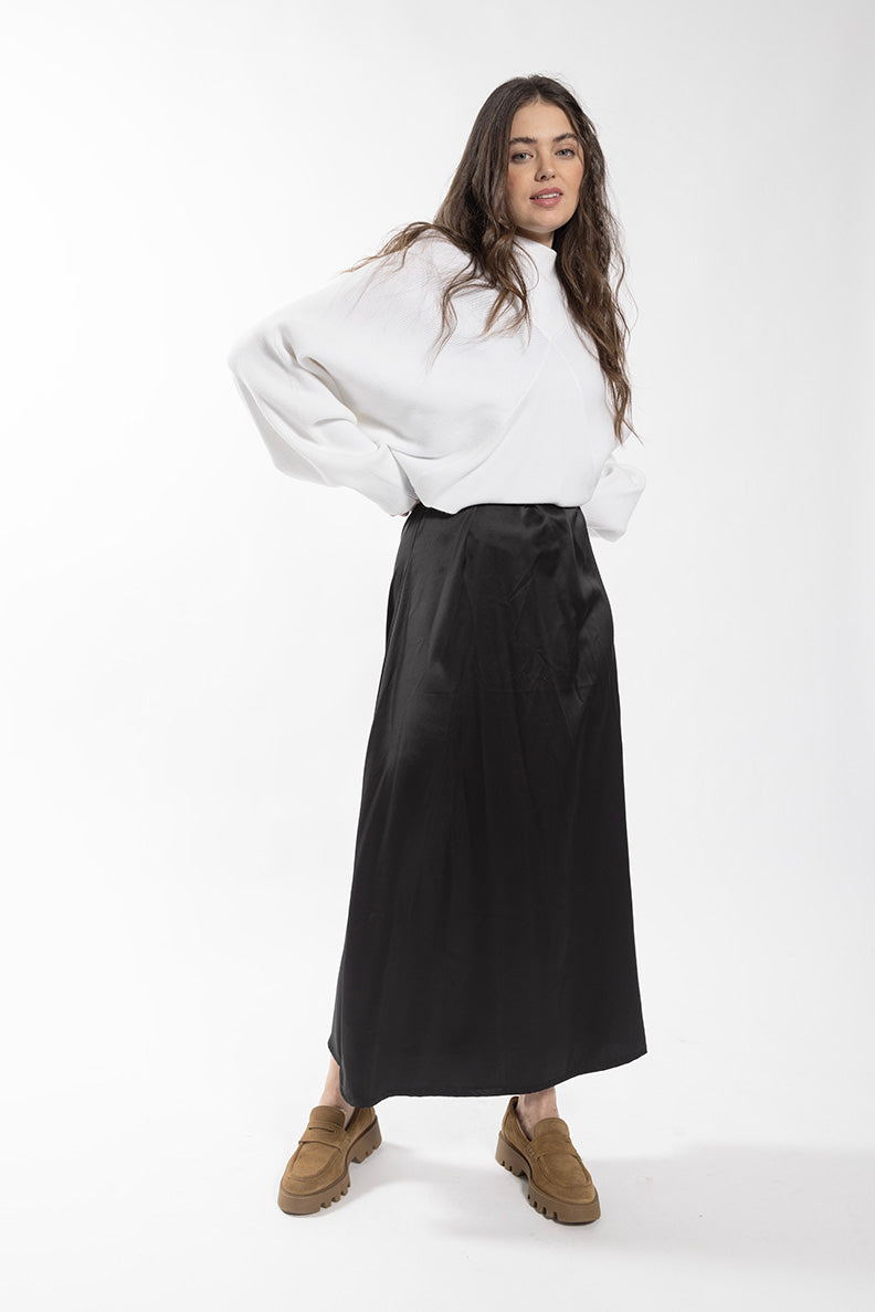 LATITUDE RIBBED V SWING SWEATER