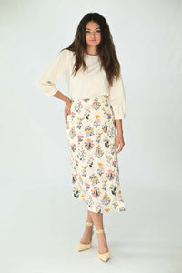 STATIC PRINTED BUTTON DETAIL ASYM SKIRT