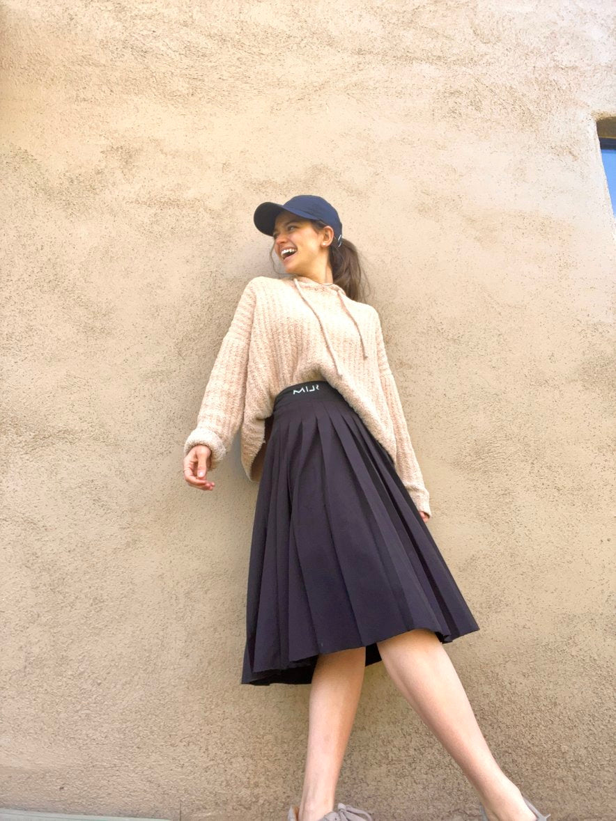 THE SLIM SKIRT VARSITY PLEATED SKIRT